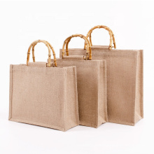 Strong inner pe coating natural hessian jute bag reusable stand-up function customize logo jute shopping bag with bamboo handle